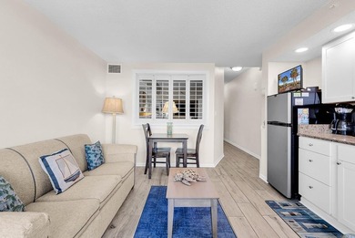 Welcome to Unit 207 at Beach Colony Resort, a charming 1-bedroom - photo 17