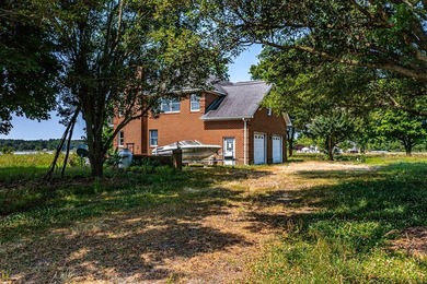 Stunning brick home built on 2 waterfront lots, in a premier - photo 7