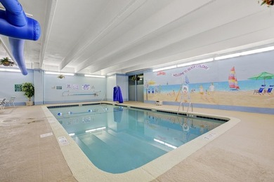 Welcome to Unit 207 at Beach Colony Resort, a charming 1-bedroom - photo 29