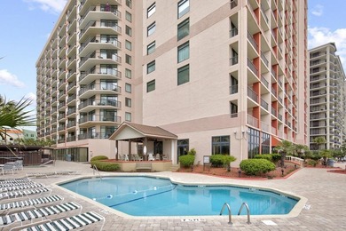 Welcome to Unit 207 at Beach Colony Resort, a charming 1-bedroom - photo 32