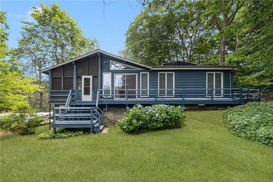 THIS OVERSIZED RAISED RANCH SITS IN A QUIET NEIGHBORHOOD IN - photo 3