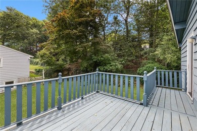 THIS OVERSIZED RAISED RANCH SITS IN A QUIET NEIGHBORHOOD IN - photo 10