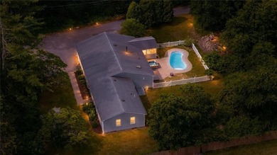 Situated on a one-acre lot along a private road, this - photo 1
