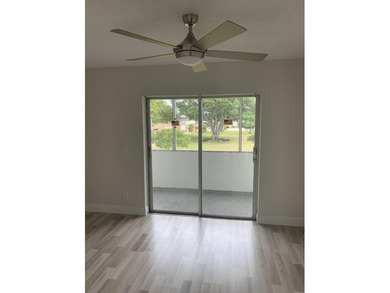 Fully remodeled unit on a quite tree lined street! Gated - photo 9