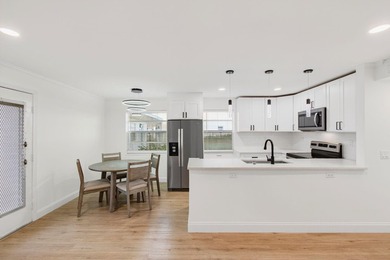 Completely Renovated 2/2 Ground-Floor Condo in Kings Point! - photo 11