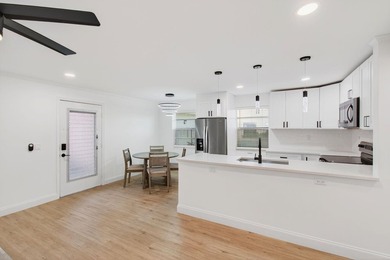 Completely Renovated 2/2 Ground-Floor Condo in Kings Point! - photo 12