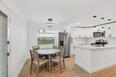 Completely Renovated 2/2 Ground-Floor Condo in Kings Point! - photo 14