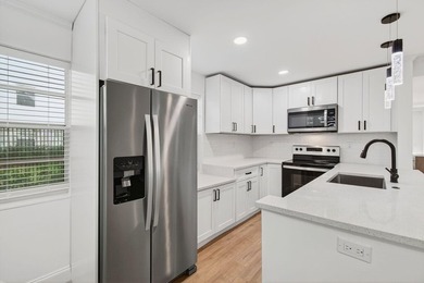 Completely Renovated 2/2 Ground-Floor Condo in Kings Point! - photo 16