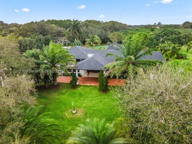 This spectacular house of almost 5 acres offers an experience - photo 17