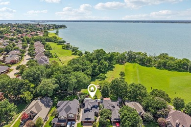 This lakefront home is a unicorn! Located within the gated - photo 1