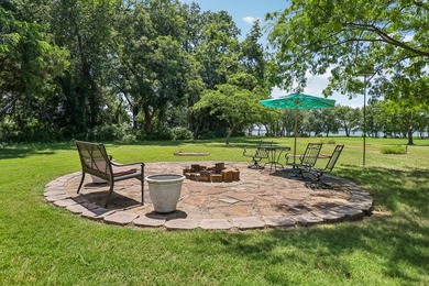 This lakefront home is a unicorn! Located within the gated - photo 4