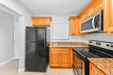 Step into this inviting 2-bedroom, 2-bath condo located in the - photo 4