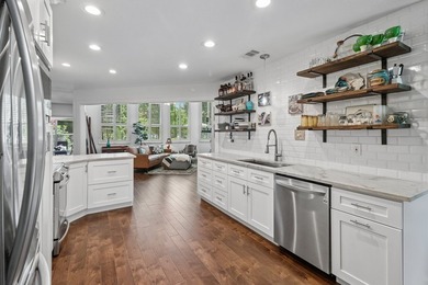 This lakefront home is a unicorn! Located within the gated - photo 10