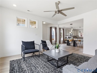 WELCOME HOME to this beautifully appointed end-unit townhome in - photo 4