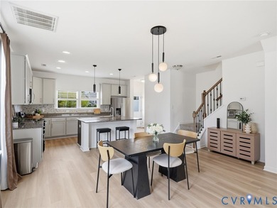WELCOME HOME to this beautifully appointed end-unit townhome in - photo 5