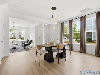 WELCOME HOME to this beautifully appointed end-unit townhome in - photo 6