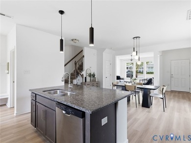 WELCOME HOME to this beautifully appointed end-unit townhome in - photo 9