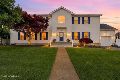 Experience elevated coastal living in this exceptional custom - photo 1
