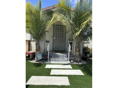 This Spanish-inspired home offers endless potential! Recent - photo 1