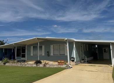 Welcome to this charming two-bedroom mobile home located in the - photo 3