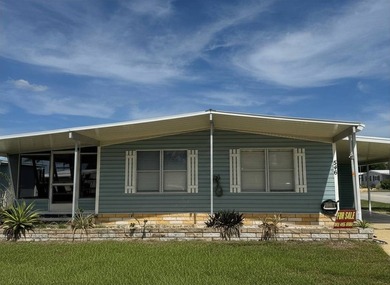 Welcome to this charming two-bedroom mobile home located in the - photo 4