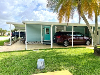 Welcome to this charming two-bedroom mobile home located in the - photo 5