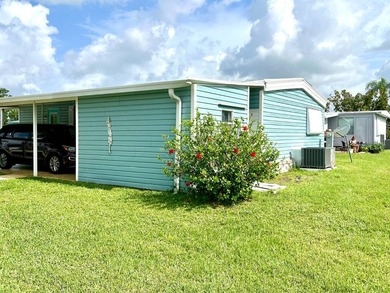 Welcome to this charming two-bedroom mobile home located in the - photo 6
