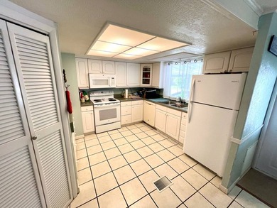 Welcome to this charming two-bedroom mobile home located in the - photo 8