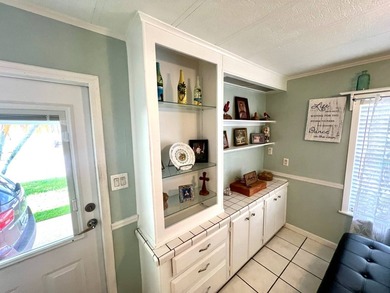 Welcome to this charming two-bedroom mobile home located in the - photo 9