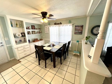 Welcome to this charming two-bedroom mobile home located in the - photo 10