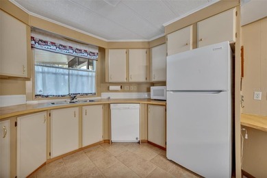 Located in the resident-owned 55+ community of Molokai, this - photo 15