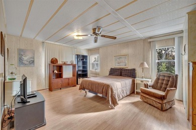 Located in the resident-owned 55+ community of Molokai, this - photo 17