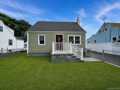 Welcome to this beautifully updated 4-bedroom, 2-bath Cape - photo 1