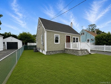 Welcome to this beautifully updated 4-bedroom, 2-bath Cape - photo 2