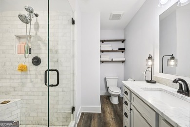 Welcome home to this fully renovated 4-sided brick ranch located - photo 17