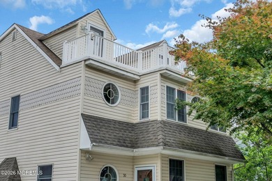 Welcome to this stunning, fully updated water view retreat in - photo 2