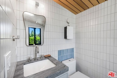 Gorgeously reimagined inside and out, this Point Dume residence - photo 26