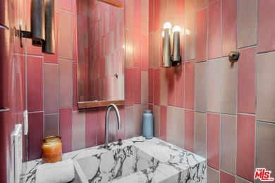 Gorgeously reimagined inside and out, this Point Dume residence - photo 29