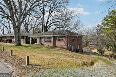 Welcome home to this fully renovated 4-sided brick ranch located - photo 38