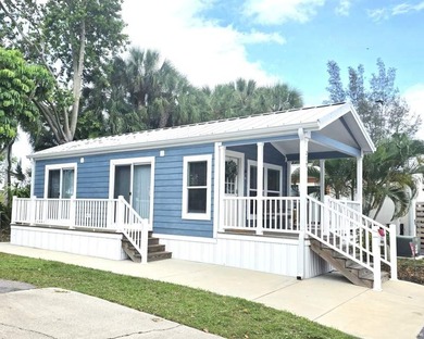 This charming Park Model home, offers a cozy living space with 1 - photo 3