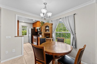 Welcome to this well-maintained first-floor condominium in the - photo 8