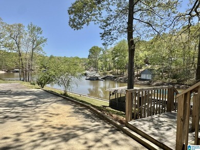Spacious lake home on a level lot with year-round water! This - photo 3