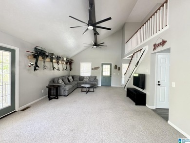 Spacious lake home on a level lot with year-round water! This - photo 6