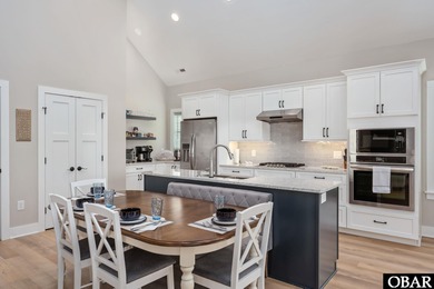 Welcome to your dream Outer Banks soundfront home; a serene