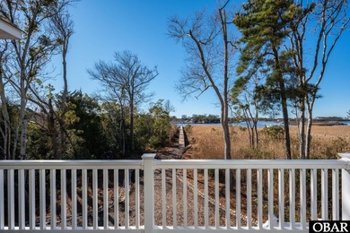 Welcome to your dream Outer Banks soundfront home; a serene