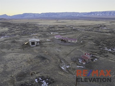 Set on 35.5 acres, this property features two modern homes, a