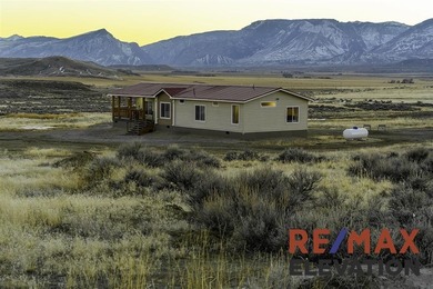 Set on 35.5 acres, this property features two modern homes, a