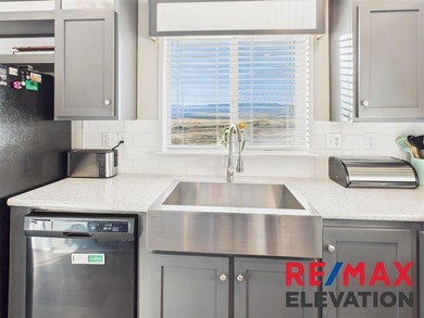 Set on 35.5 acres, this property features two modern homes, a