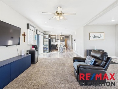 Set on 35.5 acres, this property features two modern homes, a