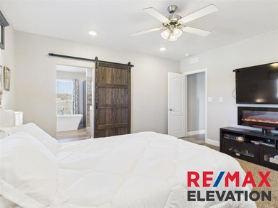 Set on 35.5 acres, this property features two modern homes, a